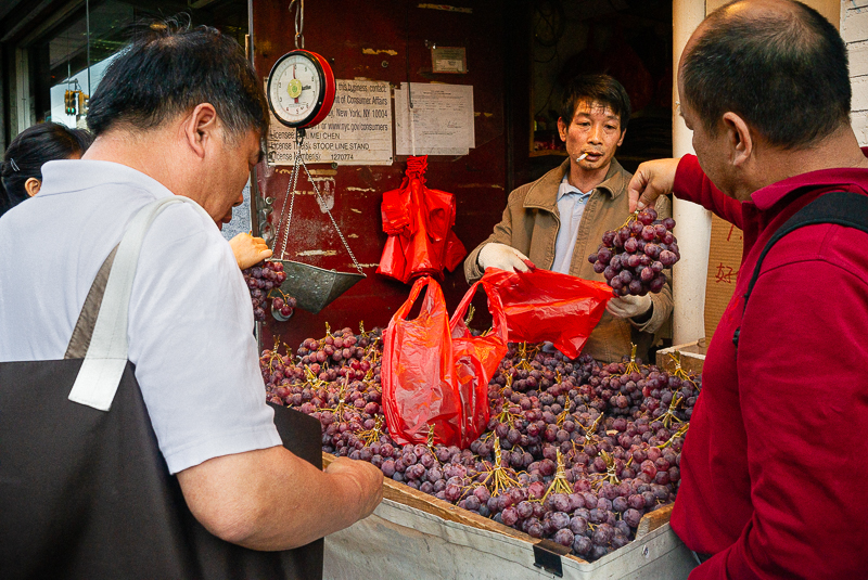 Selling grapes in Chinatown